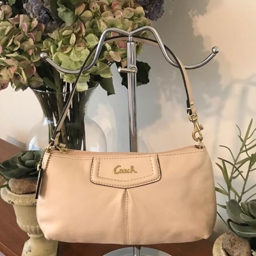 Adorable Cream leather COACH wristlet with key tag 